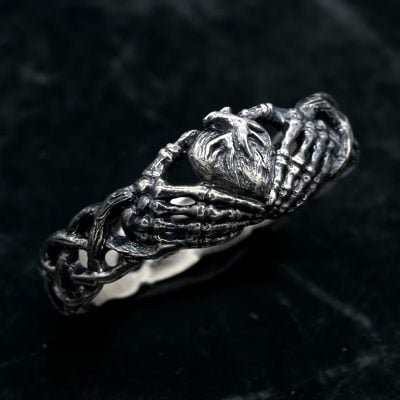 Celtic Retro Heart Hugging Hand Ring