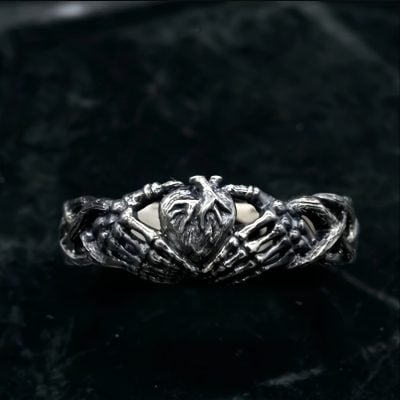 Celtic Retro Heart Hugging Hand Ring
